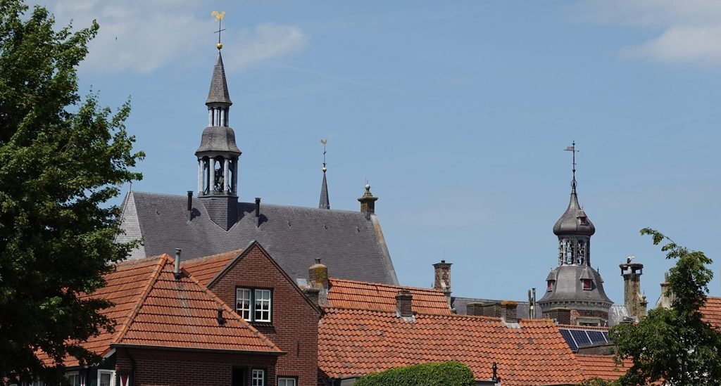 thuiskomen Gennep gemeentehuis kerk torens