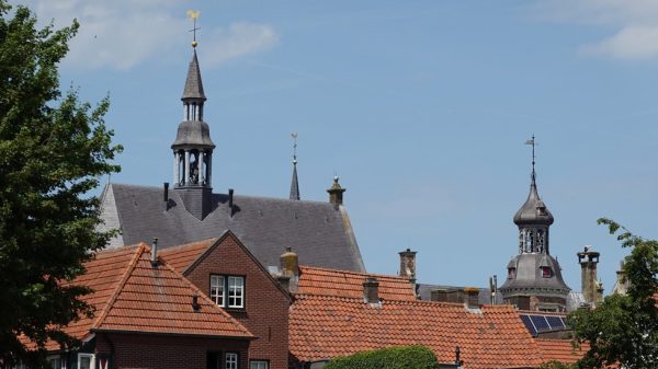 thuiskomen Gennep gemeentehuis kerk torens